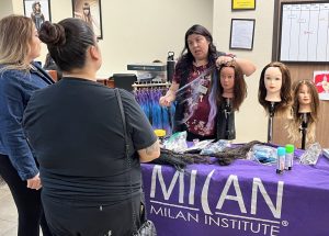 Students interested in cosmetology speak with a representative in Visalia