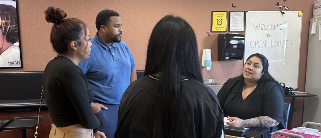 Open house event in Visalia, California allowed two dozen people to speak with instructors and staff members about Milan Institute's training programs.