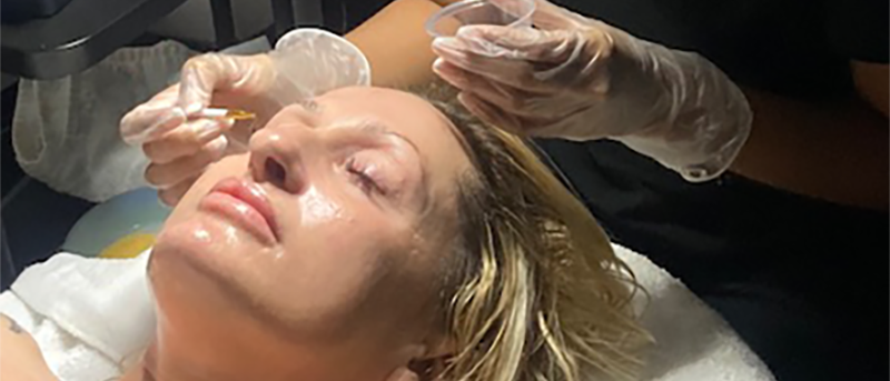 Advanced esthetician students work on brow lamination in Bakersfield, California.