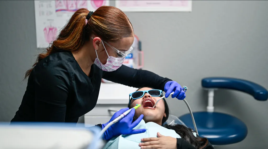 Dental assistant student performs a cleaning in Sparks, Nevada