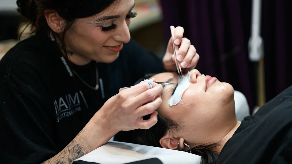 Eyelash extension student practices in San Antonio