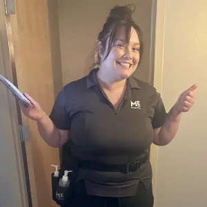 Milan Institute graduate Tiffany in her Massage Envy uniform