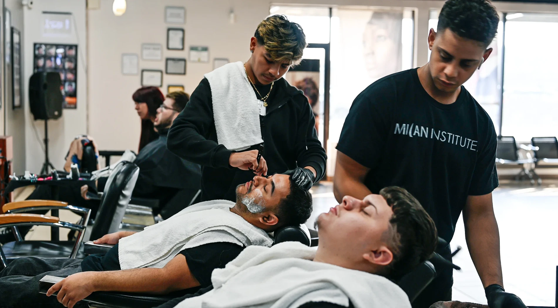 Barbering students at Milan Institute