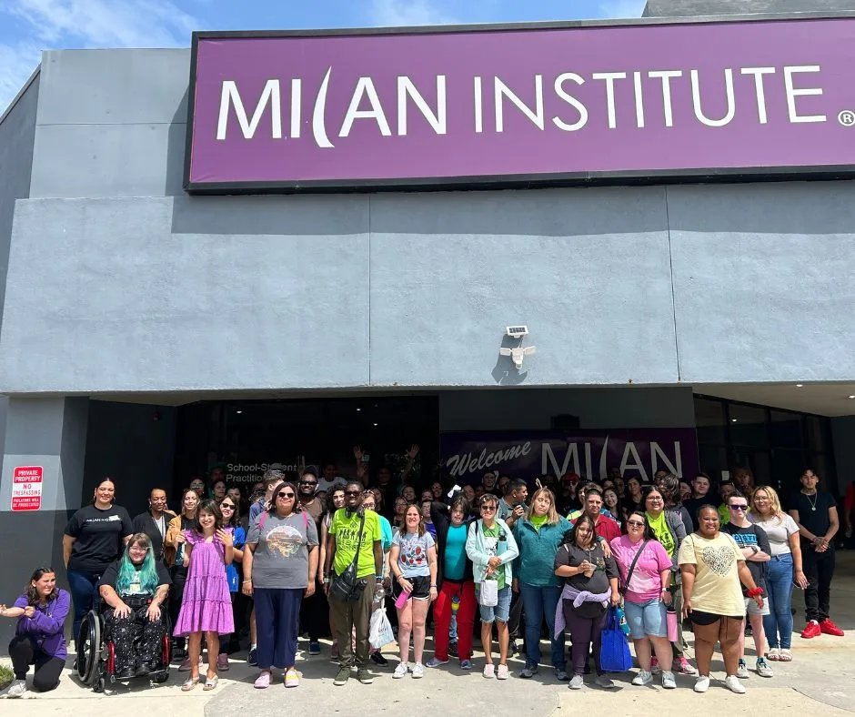 Eva's Heroes and Milan Institute students pose together after a morning of pampering in San Antonio.