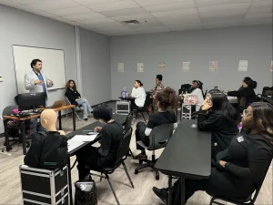 Hand and Stone in Houston speaks to our esthetician school and massage therapy students.