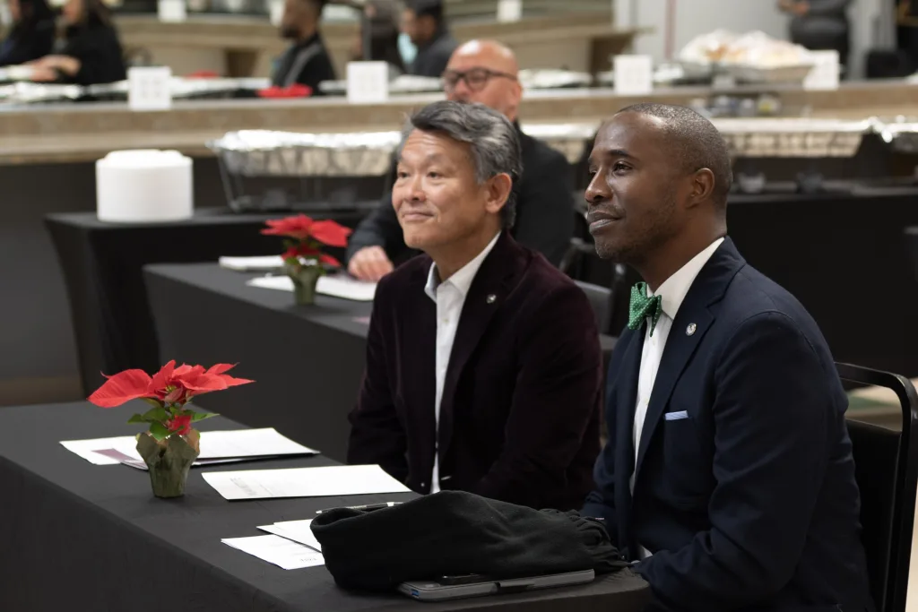 Milan Institute CEO Gary Yasuda and COE President Dr. Kirk Nooks attend a presentation at San Antonio Ingram campus.